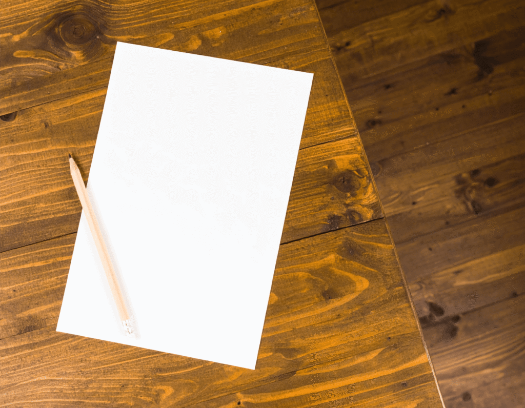 FREE A4 Paper Mockup with Pencil on Wooden Table